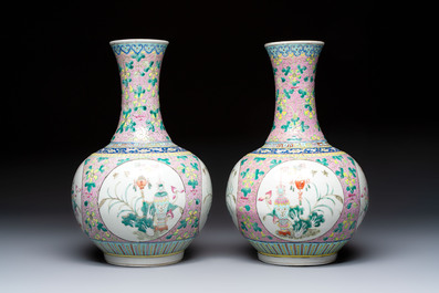 A pair of Chinese famille rose pink-ground 'Ping An Bai Sui 平安百歲' bottle vases, 19th C.