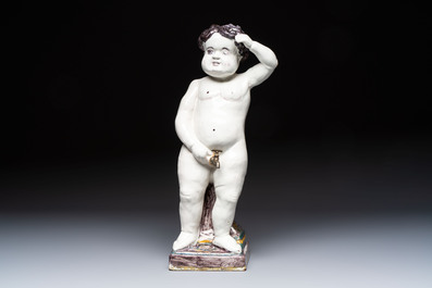 A rare large polychrome Brussels faience 'Manneken Pis' fountain with pewter tap, 18th C.