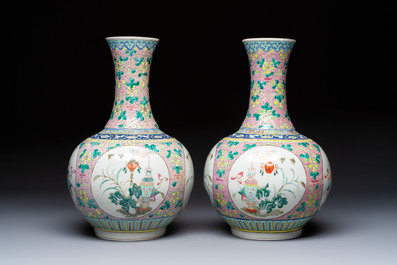 A pair of Chinese famille rose pink-ground 'Ping An Bai Sui 平安百歲' bottle vases, 19th C.