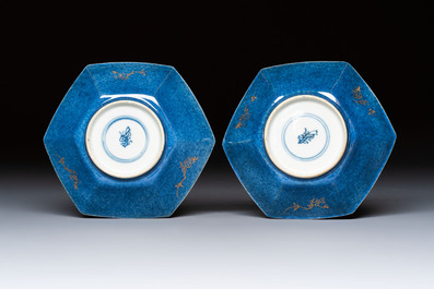 A pair of Chinese gilt-decorated powder-blue-ground 'Antiquities' cups and saucers, lingzhi mark, Kangxi