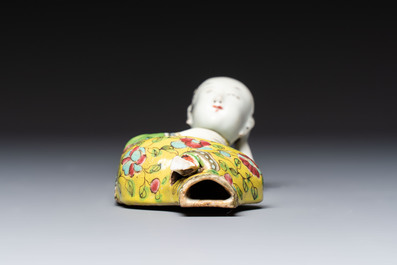 Six Chinese famille rose figures, one with a 'Lotus Throne' stand, 19th C.