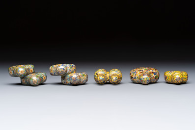 A collection of 12 Chinese cloisonn&eacute; snuff bottles with floral design, 19/20th C.