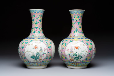 A pair of Chinese famille rose pink-ground 'Ping An Bai Sui 平安百歲' bottle vases, 19th C.