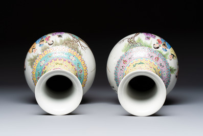 A pair of Chinese famille rose bottle vases, Qianlong mark, 20th C.
