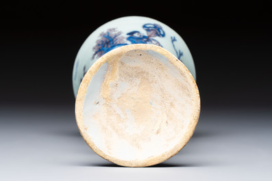An extremely rare blue, white and manganese Dutch Delft chinoiserie beaker vase after a silver model, late 17th C.