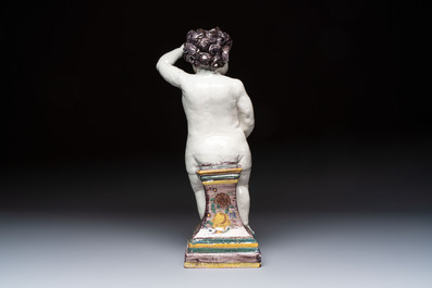 A rare large polychrome Brussels faience 'Manneken Pis' fountain with pewter tap, 18th C.