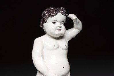 A rare large polychrome Brussels faience 'Manneken Pis' fountain with pewter tap, 18th C.