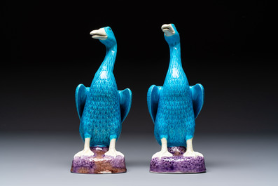 A pair of Chinese turquoise-glazed ducks and a pair of verte biscuit quail-form covered boxes, 20th C.