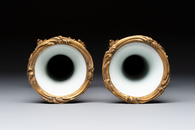 A pair of gilt-bronze-mounted Chinese famille rose capucine-ground vases and a covered bowl, Qianlong