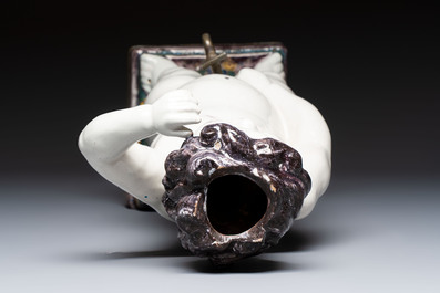 A rare large polychrome Brussels faience 'Manneken Pis' fountain with pewter tap, 18th C.