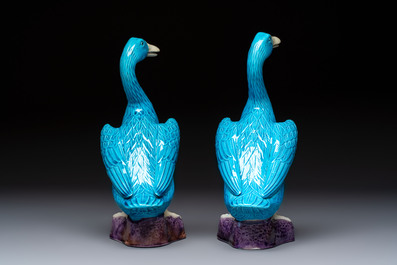A pair of Chinese turquoise-glazed ducks and a pair of verte biscuit quail-form covered boxes, 20th C.