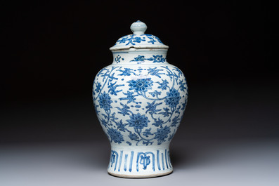 A Chinese blue and white 'Lotus Scroll' vase and cover, Ming