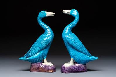 A pair of Chinese turquoise-glazed ducks and a pair of verte biscuit quail-form covered boxes, 20th C.