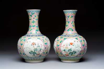 A pair of Chinese famille rose pink-ground 'Ping An Bai Sui 平安百歲' bottle vases, 19th C.