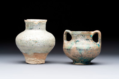 Two Raqqa turquoise-glazed pottery jars with black design, Syria, 12/13th C.