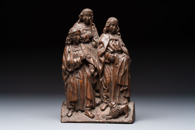 A Flemish carved oak group, 16th C.
