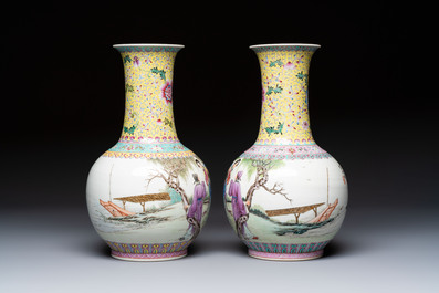 A pair of Chinese famille rose bottle vases, Qianlong mark, 20th C.