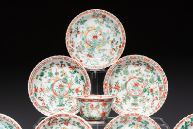 Four Chinese famille verte cups and seven saucers, 19th C.