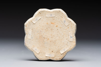 A Chinese famille rose nine-piece 'Plum Blossoms' sweetmeat set on a wooden tray, 19th C.