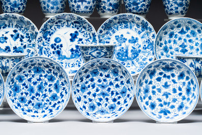 Nine Chinese blue and white cups and 12 saucers, Kangxi