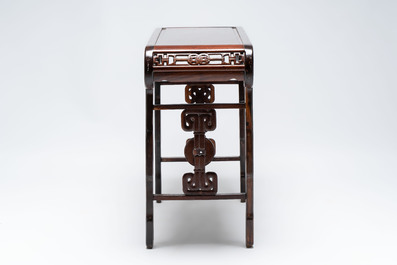 A Chinese elmwood console table, 19th C.