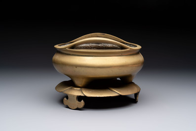 A large Chinese bronze tripod censer and stand, Wu Chen Mi Sheng Tang 戊辰米生堂 mark, dated 1868