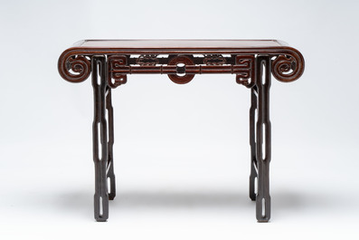 A Chinese elmwood console table, 19th C.