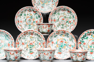 Four Chinese famille verte cups and seven saucers, 19th C.