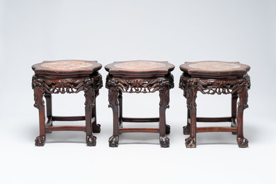 Four Chinese marble-topped hongmu stands, 19/20th C.