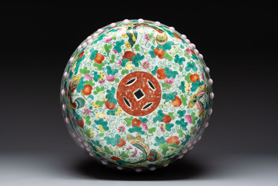 A Chinese famille rose garden seat with butterflies, flowers and fruiting branches, 19th C.