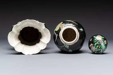 A Chinese verte biscuit black-ground vase and a covered jar, Xuande and Kangxi mark, 19th C.