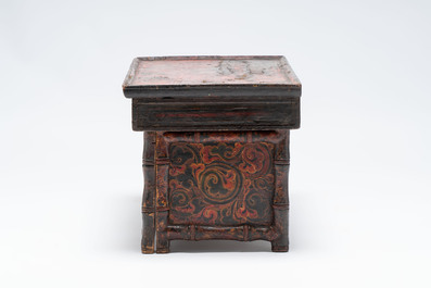A Tibetan finely painted polychrome wooden folding table and an altar table, 18/19th C.
