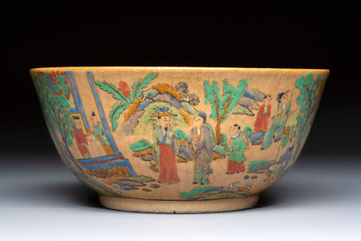 A Chinese famille rose 'Millefleurs' plate, a 'Dragons' plate, and a Nanking famille verte caf&eacute;-au-lait-ground bowl, Qianlong marks, 19/20th C.
