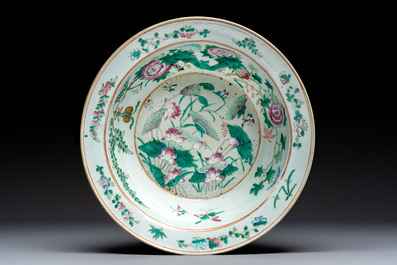 A large Chinese famille rose 'Dragon' basin and a basin with floral design, 19th C.