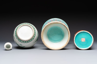 A Chinese famille rose spittoon, a famille verte covered double-gourd vase and a gilt-decorated coral-red-ground hat stand, Daoguang mark, 19th C.