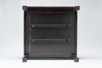 A Chinese nanmu square low table, 19th C.