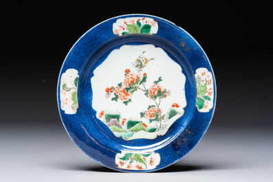 Three Chinese famille verte plates with floral design, one powder-blue-ground, Kangxi