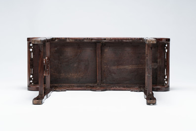 A Chinese elmwood console table, 19th C.