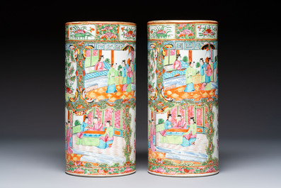 A pair of Chinese Canton famille rose hat stands, a covered vase, a vase and a bowl, 19th C.