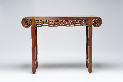 A Chinese burlwood-topped hardwood console table, 19th C.