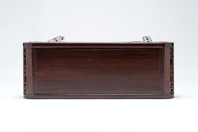 A Chinese elmwood console table, 19th C.