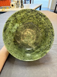 A large Chinese mottled-green serpentine bowl, 20th C.