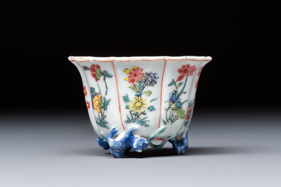 A rare Chinese famille rose moulded cup and saucer with floral design, Yongzheng