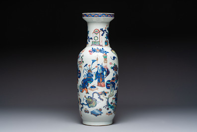 A Chinese doucai and famille rose rouleau vase with figures among antiquities, 19th C.