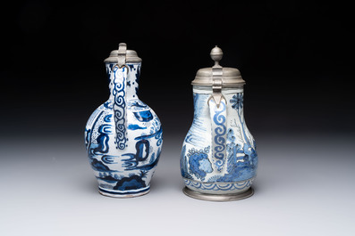 Two blue and white Dutch Delft chinoiserie jugs with pewter lid, 17/19th C.