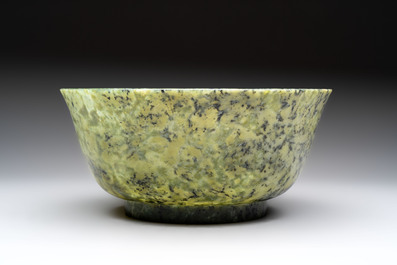 A large Chinese mottled-green serpentine bowl, 20th C.