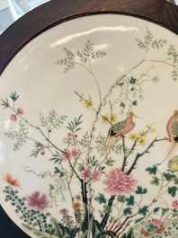 A Chinese hardwood stand with a mounted famille rose plaque, Republic