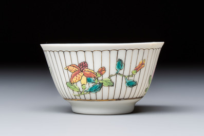 A Chinese famille rose cup and saucer with floral design, Yongzheng