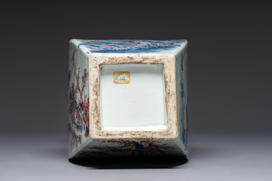 A Chinese blue, white and copper-red 'Birds among Flowering Branches' square gourd vase, 19th C.