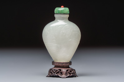 A Chinese carved white jade 'Geese' snuff bottle with a wooden stand, 18/19th C.